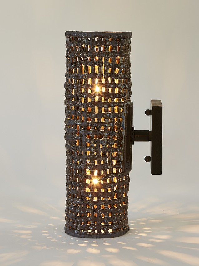 Handmade stoneware Cylinder Basketweave sconces are suitable for both indoor & outdoor use. With a gorgeous basketweave texture, these sconces by Clate Grunden are the perfect addition to any modern interior.