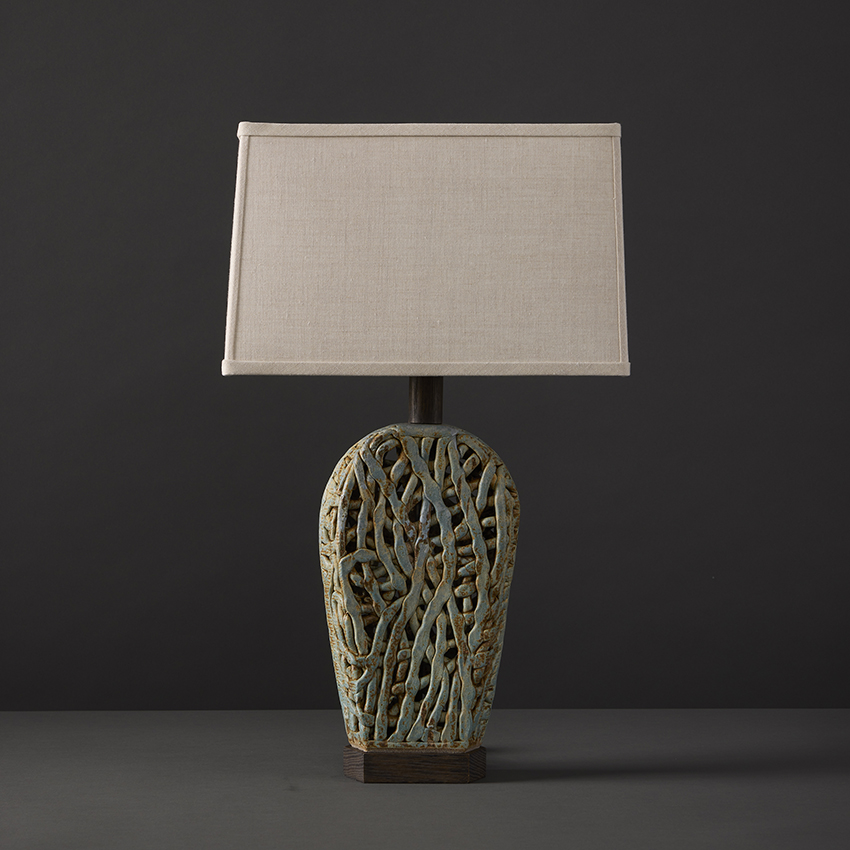 Handmade ceramic Haystack Squiggle Weave table lamp by ceramicist Clate Grunden combines organic forms with beach blue glaze for a classic and effortlessly beautiful table lamp, available at RUNE, New York.