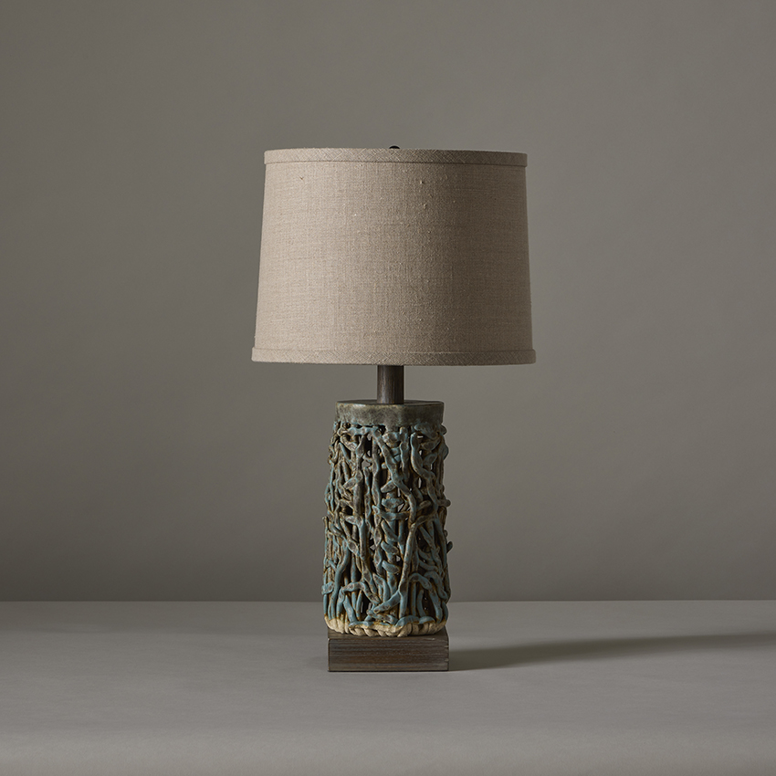 Small Squiggle Weave handmade ceramic table lamp by artist Clate Grunden in textured beach blue glaze with sand linen lampshade, available from RUNE, New York.
