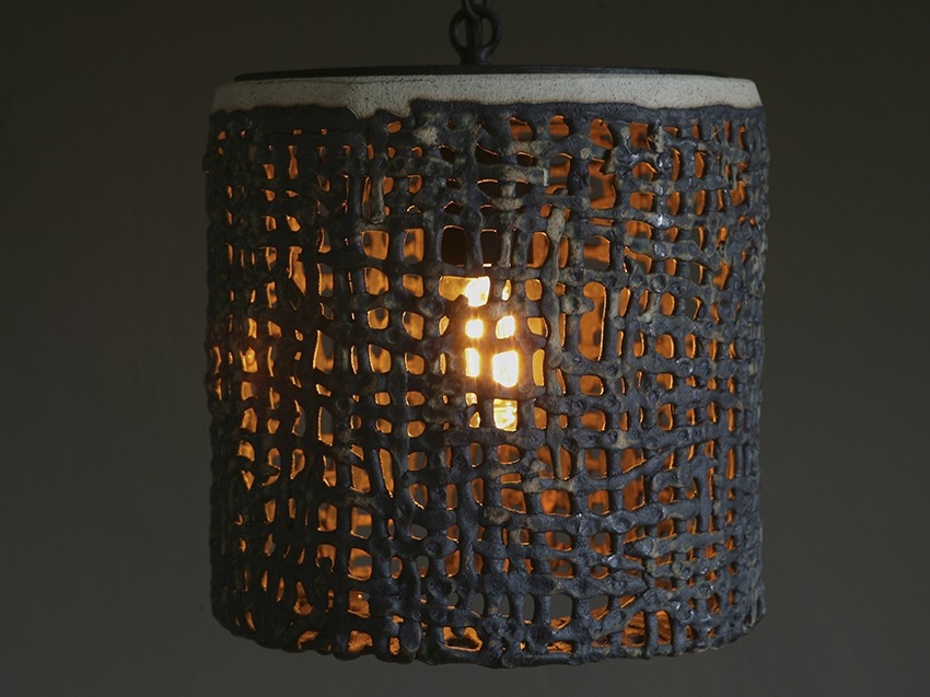 Wide Hanging Basketweave Pendant by ceramicist Clate Grunden in white clay & verdigris glaze offers lighting for indoor & outdoor applications.