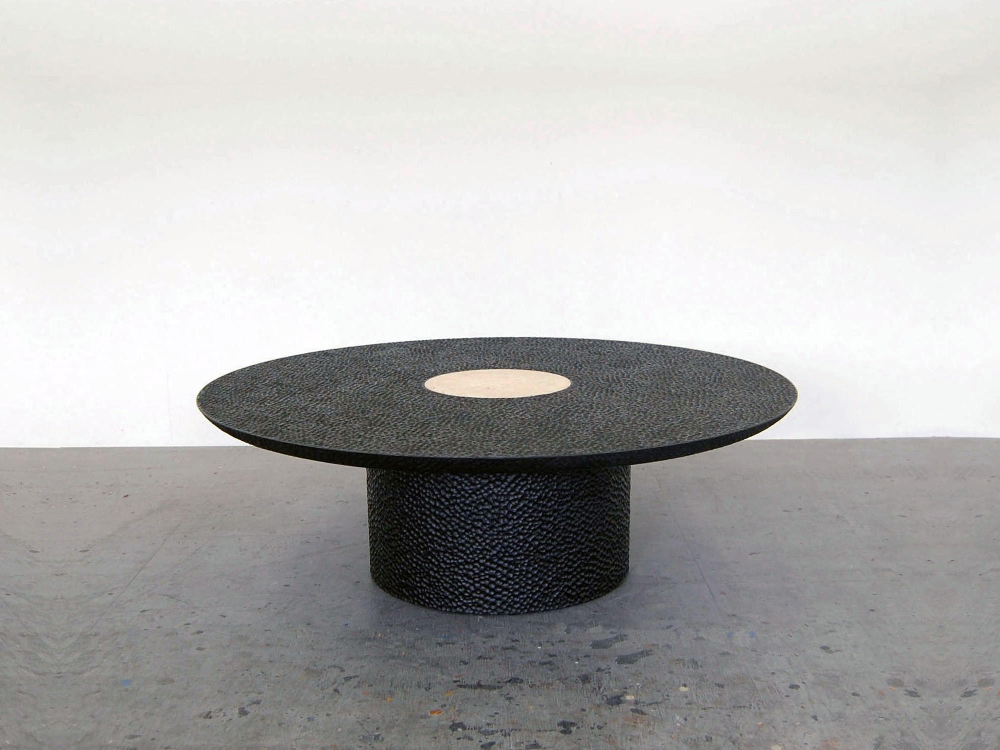 Luna Coffee Table in carved, blackened maple & travertine by John Eric Byers for RUNE, New York.