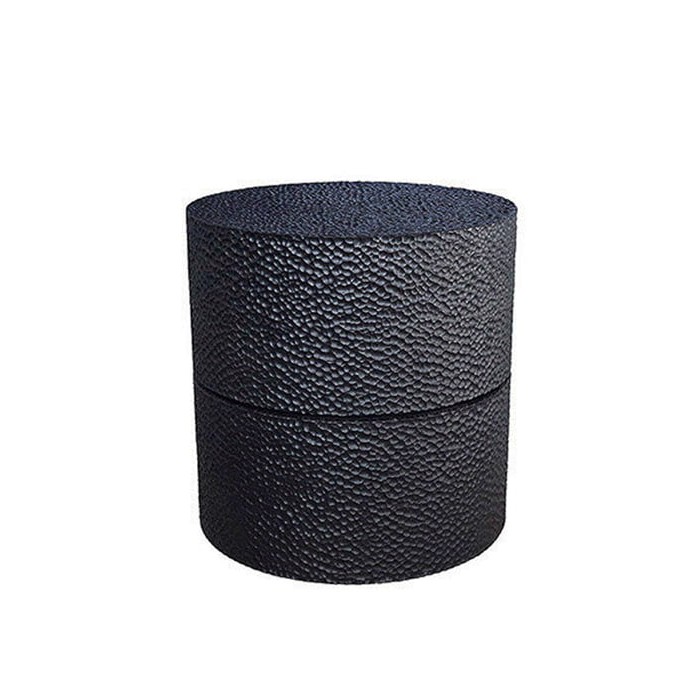 Round Reveal Table #1 in carved, blackened maple by John Eric Byers for RUNE, New York.