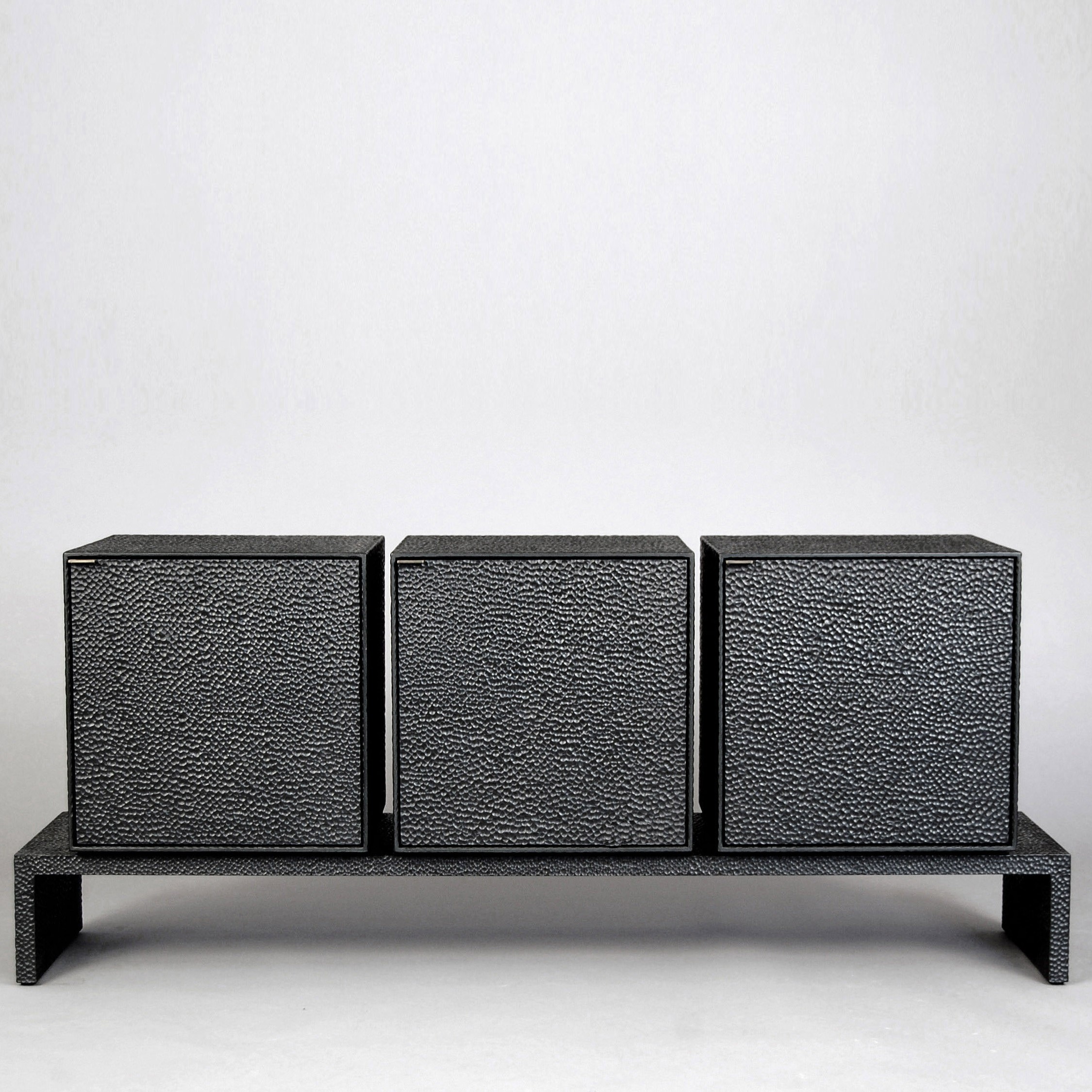 M3 Credenza in carved, blackened maple & brass by John Eric Byers for RUNE, New York.