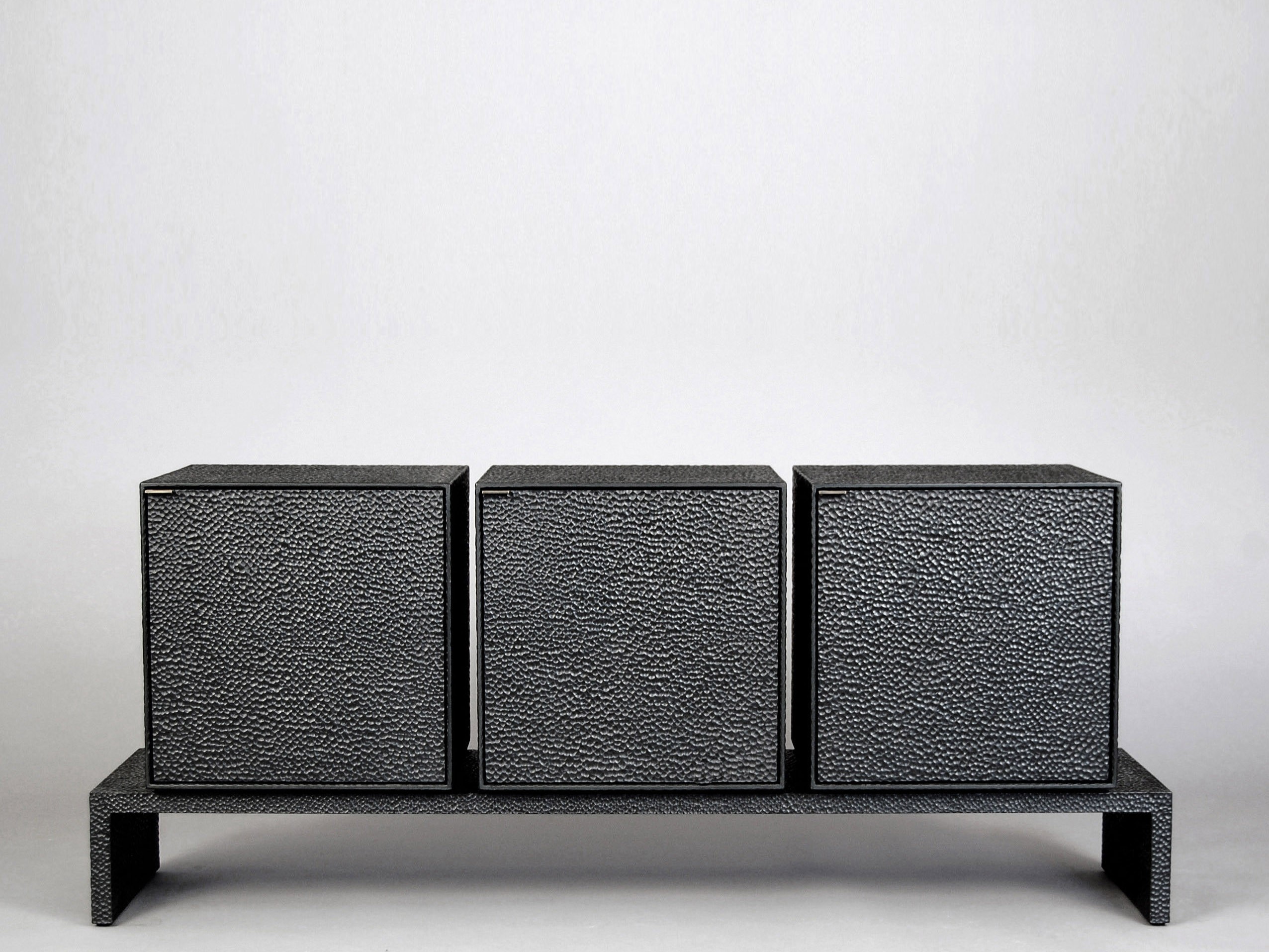 M3 Credenza in carved, blackened maple & brass by John Eric Byers for RUNE, New York.