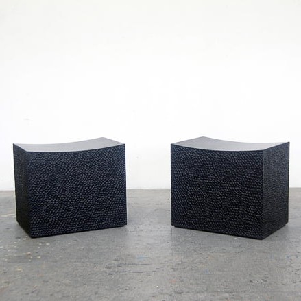 Block Stools in carved, blackened maple by John Eric Byers for RUNE, New York.