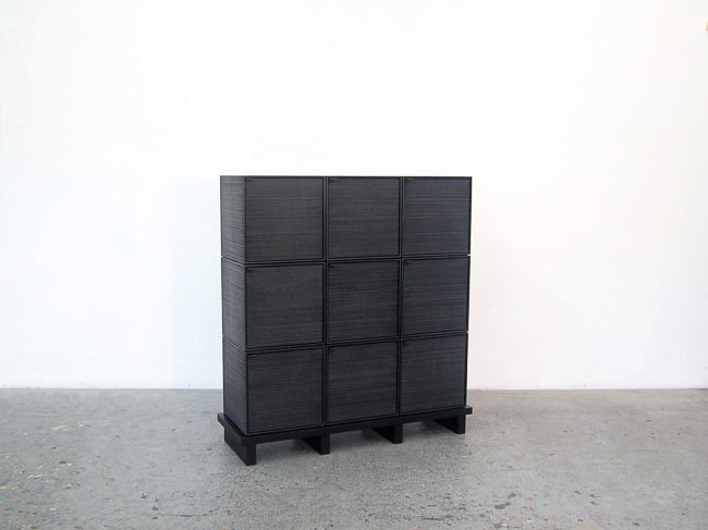 9 Cubes Chest of Doors sawn, blackened maple & brass by John Eric Byers for RUNE, New York.