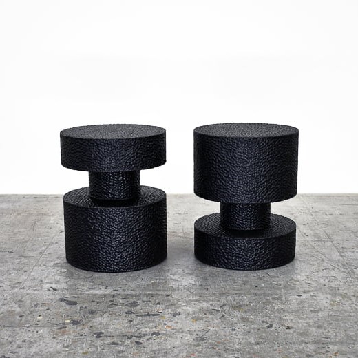 Round Revert Tables / Stools in carved, blackened maple by John Eric Byers for RUNE, New York.