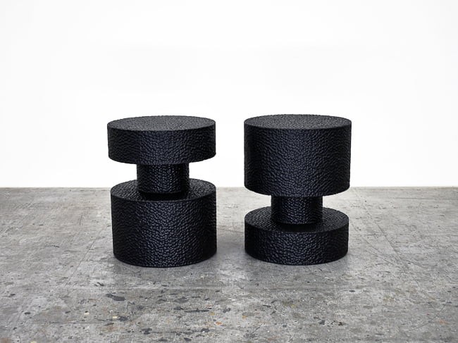 Round Revert Tables / Stools in carved, blackened maple by John Eric Byers for RUNE, New York.