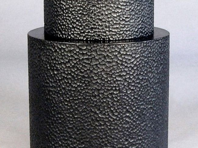 Table #13 in carved, blackened maple by John Eric Byers for RUNE, New York.