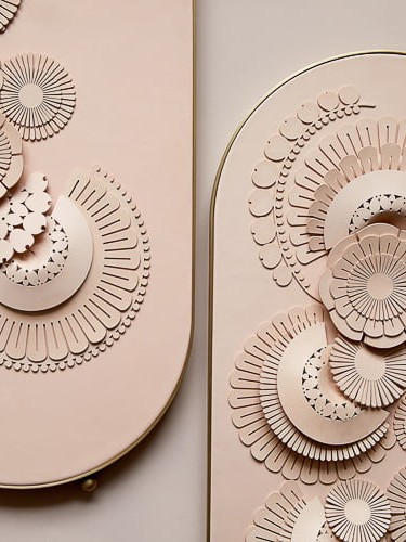 Floral leather panels in Rose vegetable tanned leather with brass frame.