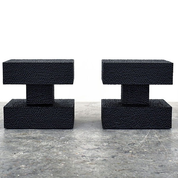 Pillar Tables / Stools in carved, blackened maple by John Eric Byers for RUNE, New York.