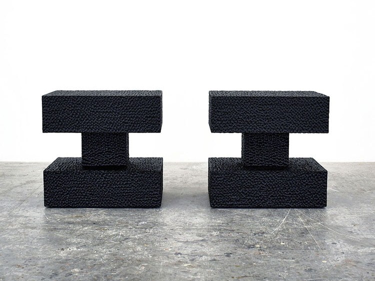 Pillar Tables / Stools in carved, blackened maple by John Eric Byers for RUNE, New York.