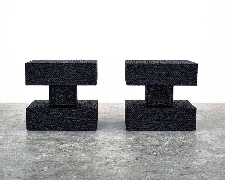 Pillar Tables / Stools in carved, blackened maple by John Eric Byers for RUNE, New York.