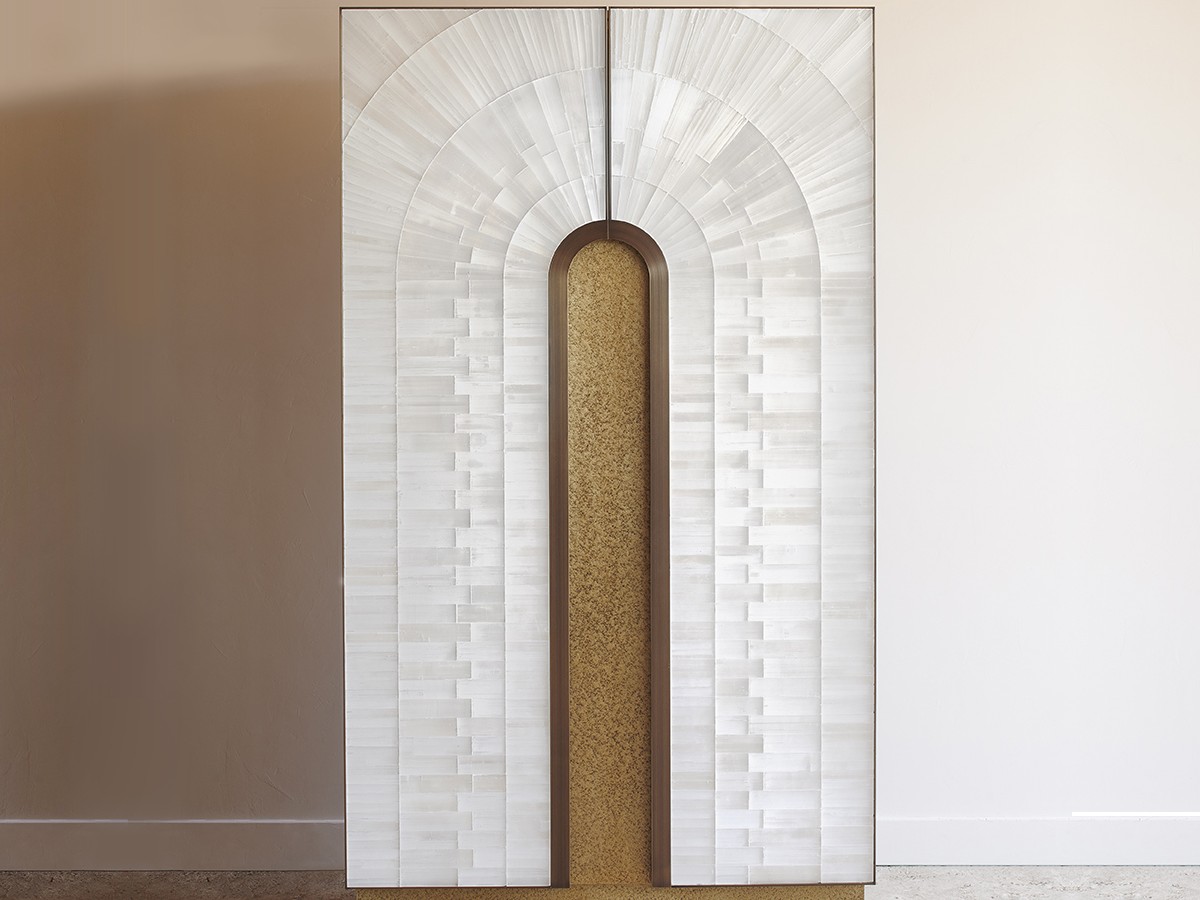 Modern selenite gypse cabinet with wood arch inset.