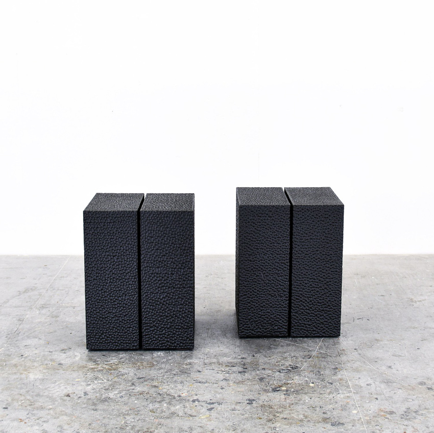 Vertical Reveal Tables in carved, blackened maple by John Eric Byers for RUNE, New York.