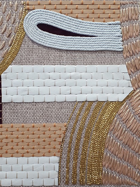 Mixed material bespoke embroidery for large surfaces.