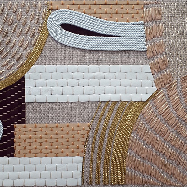 Mixed material bespoke embroidery for large surfaces.