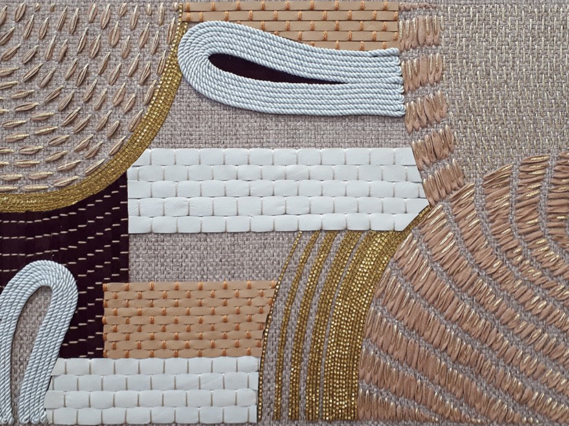 Mixed material bespoke embroidery for large surfaces.