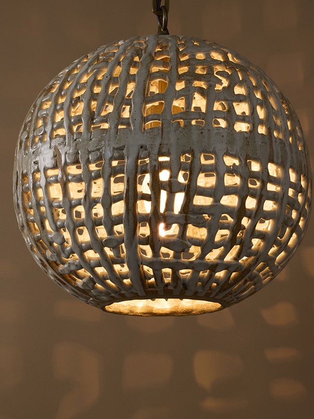 Hand-built & glazed Basketweave Sphere Pendant with woven stoneware texture, suitable for indoor & outdoor applications by ceramicist Clate Grunden, shown in white clay with matte white glaze & antique brass French chain. Available from RUNE, New York.