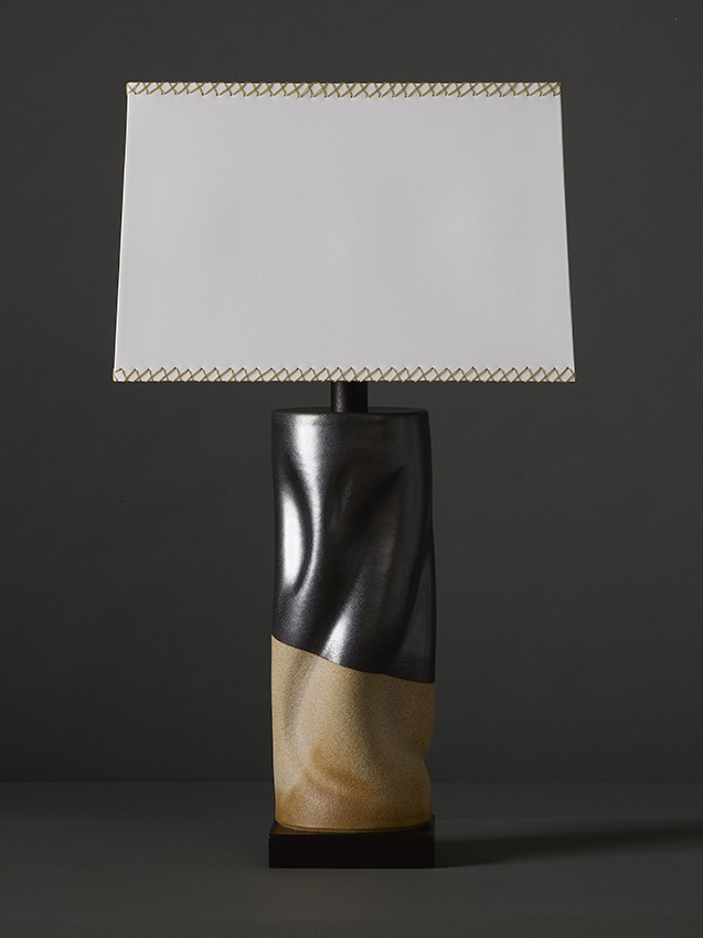 High contrast, sculptural artisan stoneware table lamp in white clay & matte black glaze by ceramic artist Clate Grunden, available from RUNE, New York, offers a striking aesthetic for modern interiors.