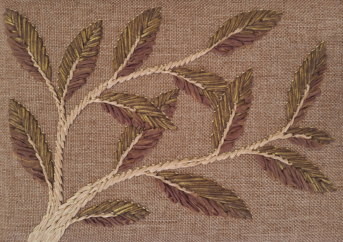 P+L Studio's handmade embroidery using traditional techniques to create a modern branch & leaf design that appears to grow organically across a beautifully textured fabric, available at RUNE, New York.