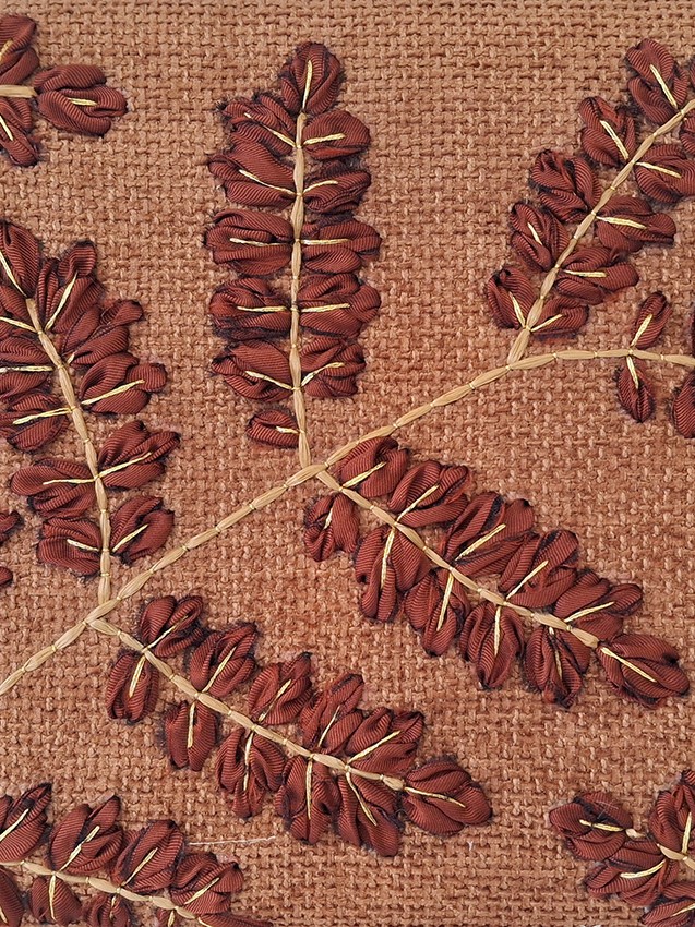 View of P+L Studio’s hand-embroidered fabric in an elegant & textured flowering branch pattern. Their textile designs are crafted in France, ideal for high-end furniture and interior projects.